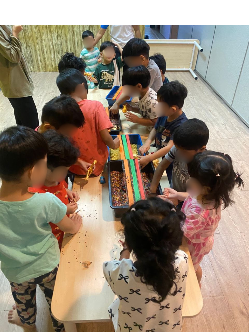 Therapist supporting a special needs child during therapy in Ipoh, Perak, Malaysia